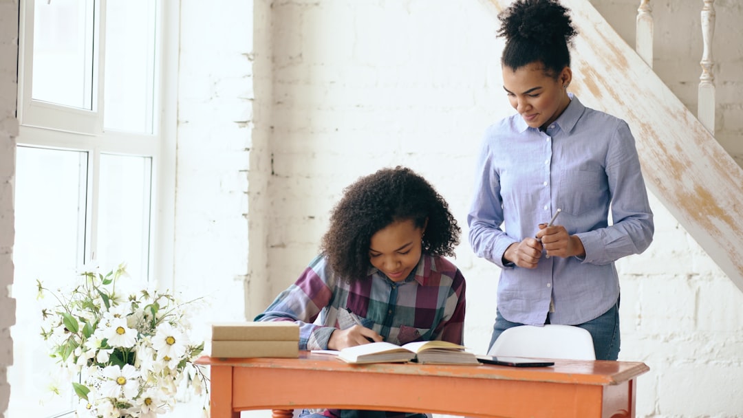 mother helping child with homework